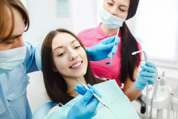 assistant dentist patient clinic